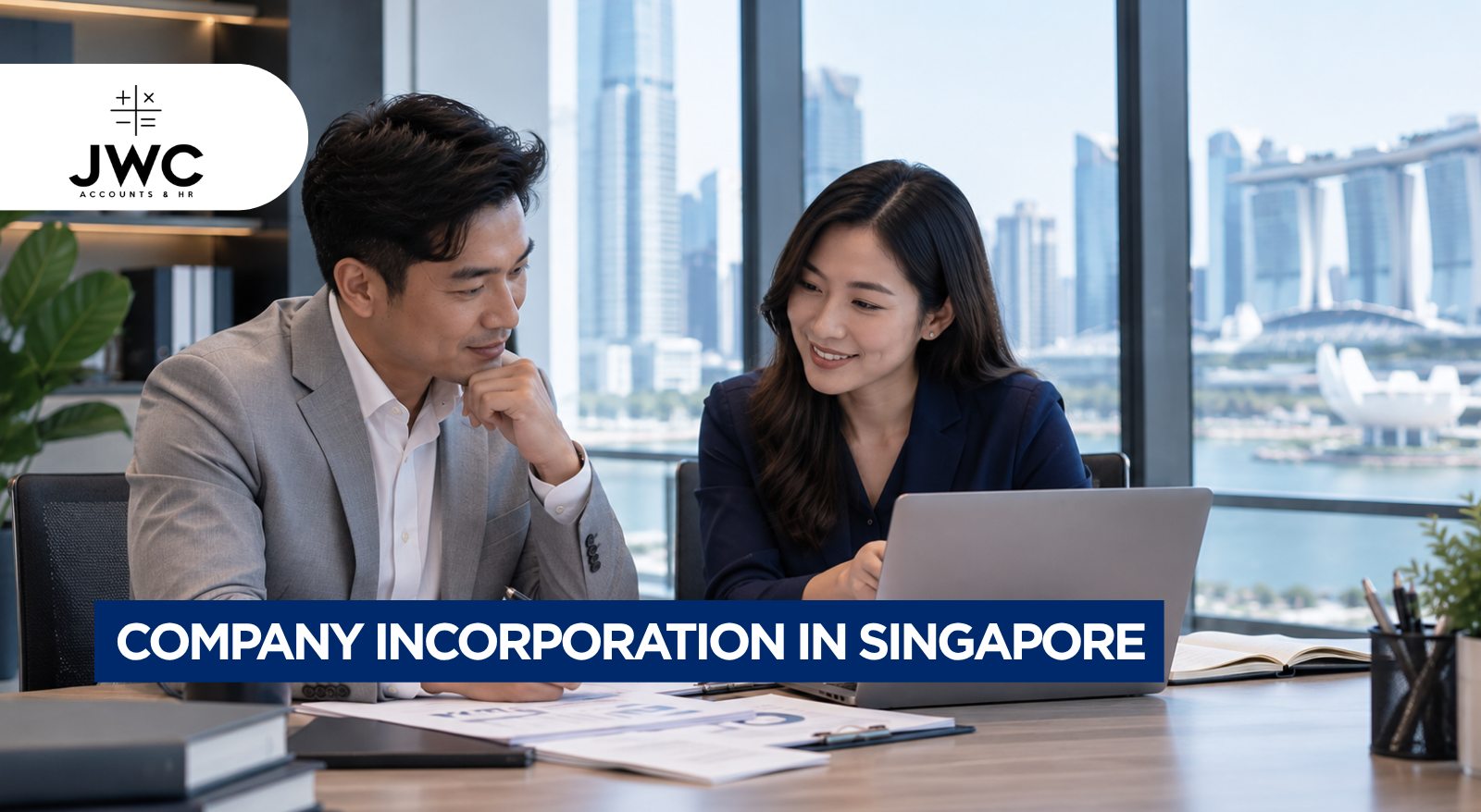Singapore SME business owner reviewing an accounting backlog and financial documents at a desk