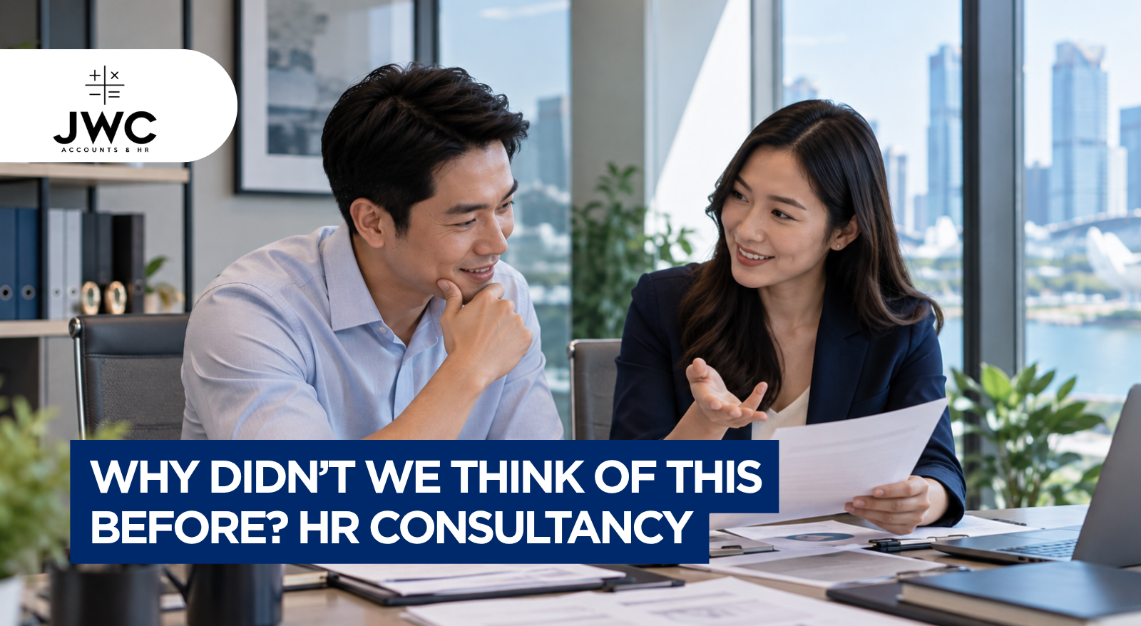 Singapore SME business owner reviewing an accounting backlog and financial documents at a desk